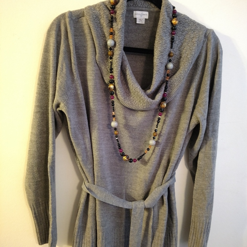 Jaclyn Smith draped turtleneck sweater